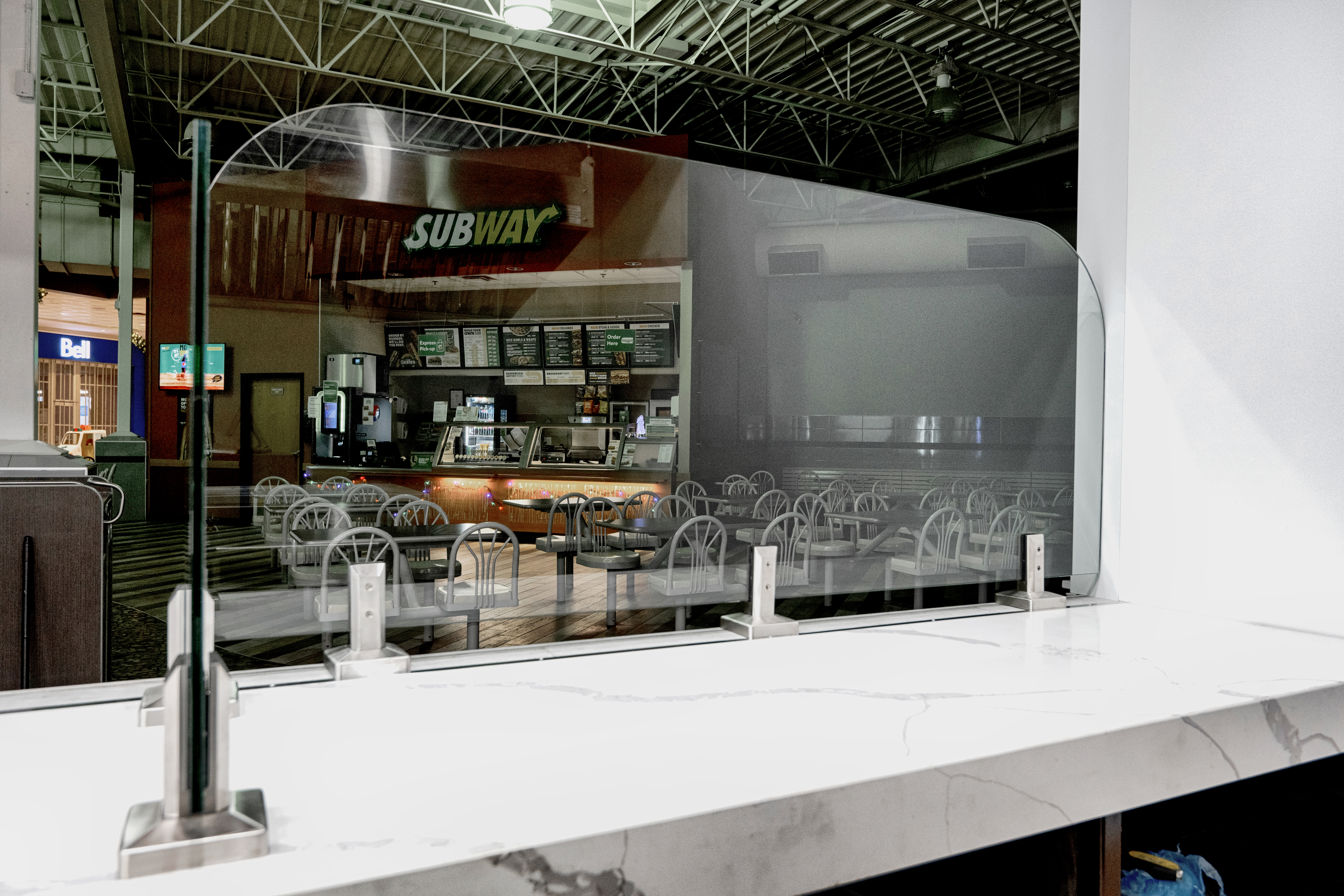 metal panels installation and design of pizza place at the food court in Maple Ridge